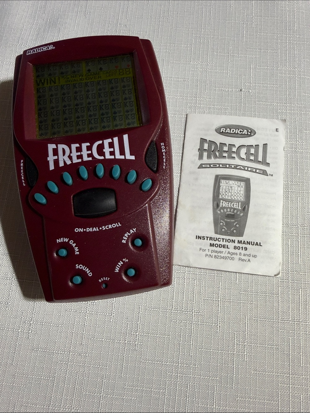 Radica FreeCell Handheld Electronic Game - Burgundy